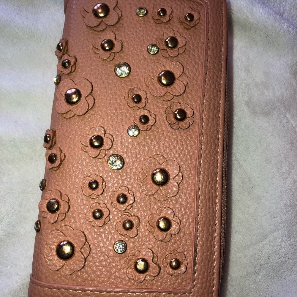 Under one sky hand purse